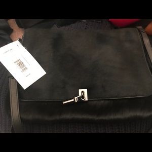 Elizabeth and James calf hair crossbody bag.